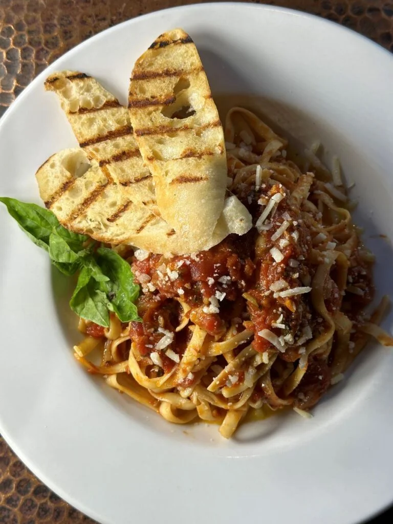 pasta dish with freshly tasted baguette