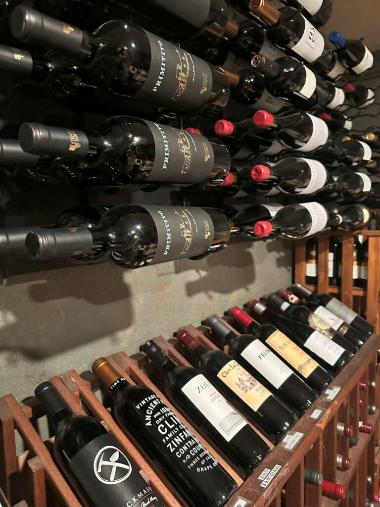 stocked wine shelf close up