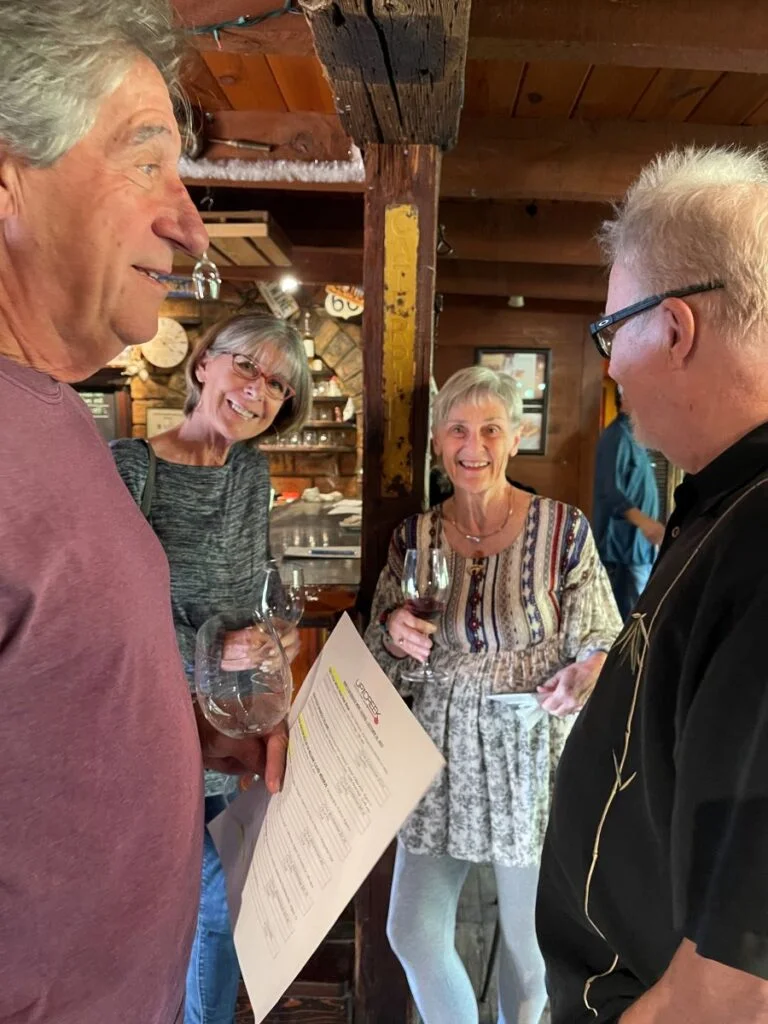 People enjoying wine club event at UTC